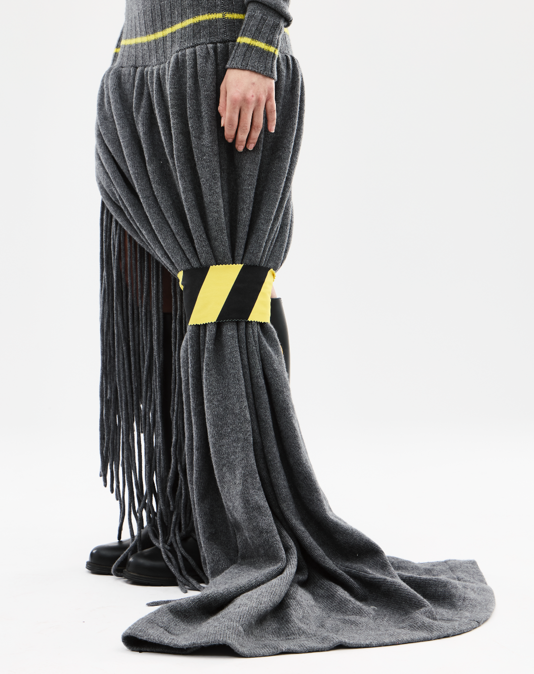 Gray fringe skirt with yellow accents on a white background